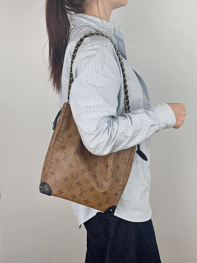 Louis Vuitton Shoulder Bag NOÉ TRUNK Monogram PVC Small 23 × 8 × 27 cm — on-model view 1 of 2