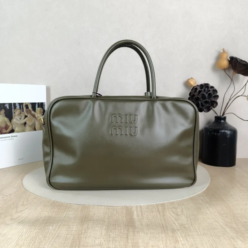 Miumiu Top Handle Bag Beau CC alfskin 34 × 10 × 23 cm
