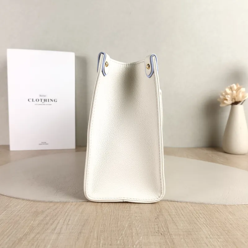 Louis Vuitton Shoulder Bag Onthego White · Blue Monogram Empreinte Embossed Calfskin Small 25 × 11.5 × 19 cm — detail view 4 of 11