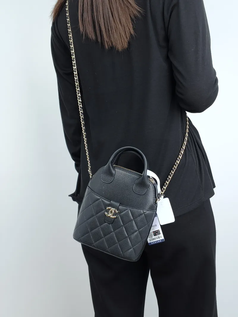 Chanel Top Handle Bag25a Edition Top Handle Bag Black Grained Calfskin One Size15.5 × 6.5 × 8.5 cm — on-model view 3 of 3