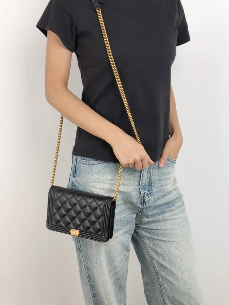 Chanel Crossbody Bag Le Boy​ WOC Black Grained Calfskin Mini 19.2 × 3.5 × 12.3 cm — on-model view 1 of 2