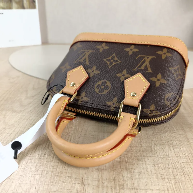 Louis Vuitton Crossbody Bag Alma Nano Monogram PVC nano 18 × 8 × 12 cm — detail view 7 of 12