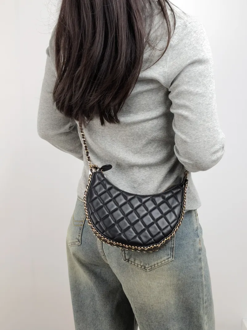 Chanel Shoulder Bag Black Lambskin Small 20 × 6 × 15 cm — on-model view 1 of 2