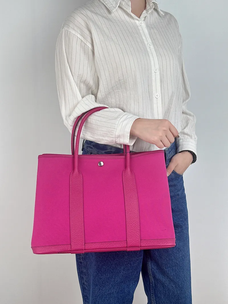 Hermès Top Handle Bag Garden Party 36 36 9I Canvas · Negonda Calfskin Large 36 × 17 × 26 cm Y — on-model view 2 of 2