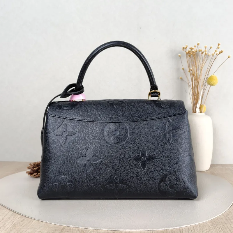 Louis Vuitton Crossbody Bag MADELEINE Black Monogram Empreinte Embossed Calfskin Medium 30 × 11 × 19.5 cm — cover view 2 of 5