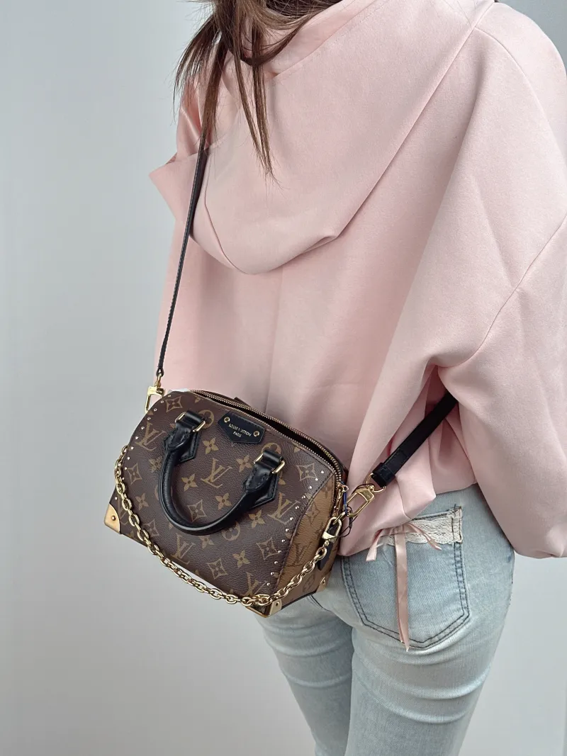 Louis Vuitton Crossbody Bag Speedy Trunk 20 Monogram PVC Small 20.5 × 11 × 13.5 cm — on-model view 1 of 2