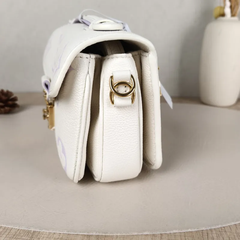 Louis Vuitton Crossbody Bag Pochette Métis East West White · Monogram Empreinte Embossed Calfskin Small 21.5 × 6 × 13.5 cm — detail view 14 of 15