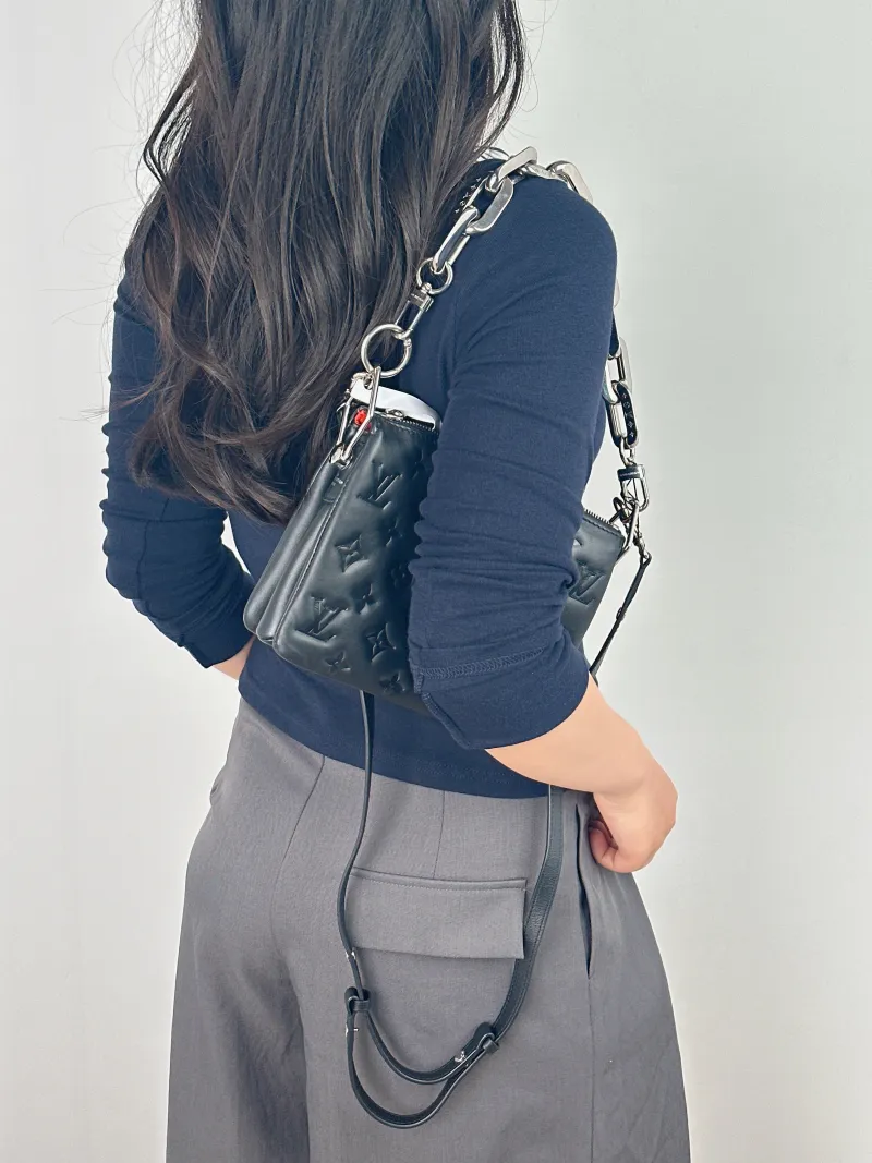 Louis Vuitton Crossbody Bag Coussin BB Black Lambskin BB21 × 7 × 16 cm — on-model view 1 of 2