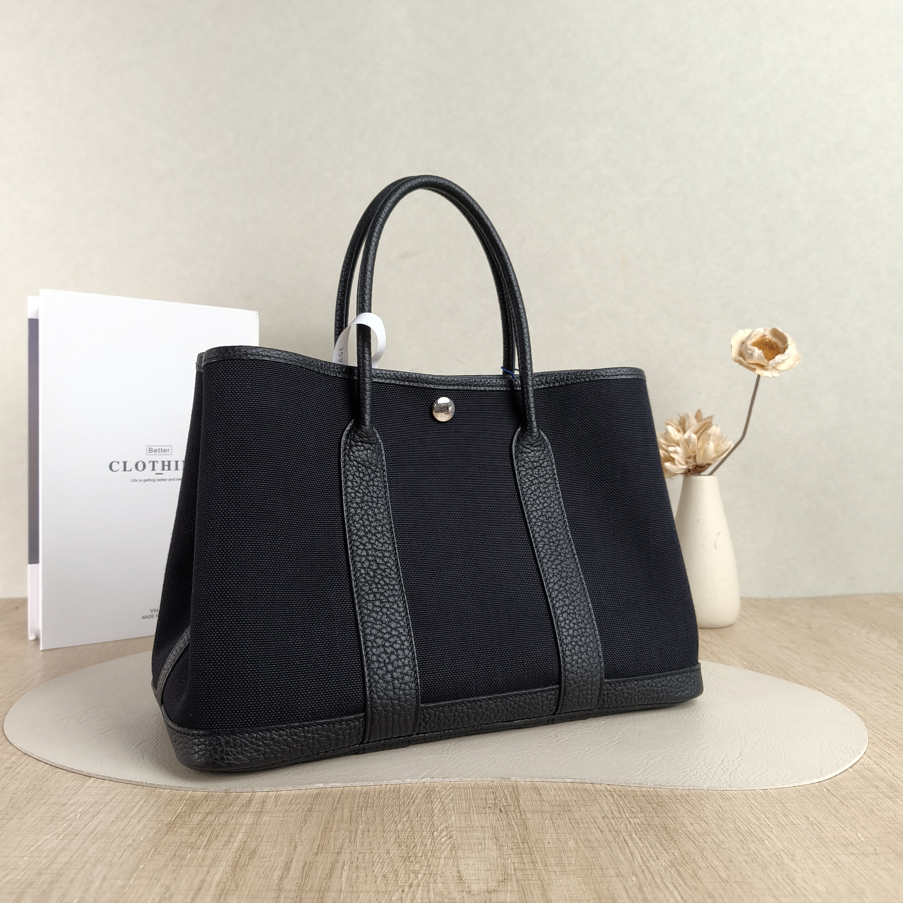 Hermès Top Handle Bag Garden Party 30 3089Black Canvas · Negonda Calfskin Medium30 × 13 × 21 cm — cover view 2 of 5