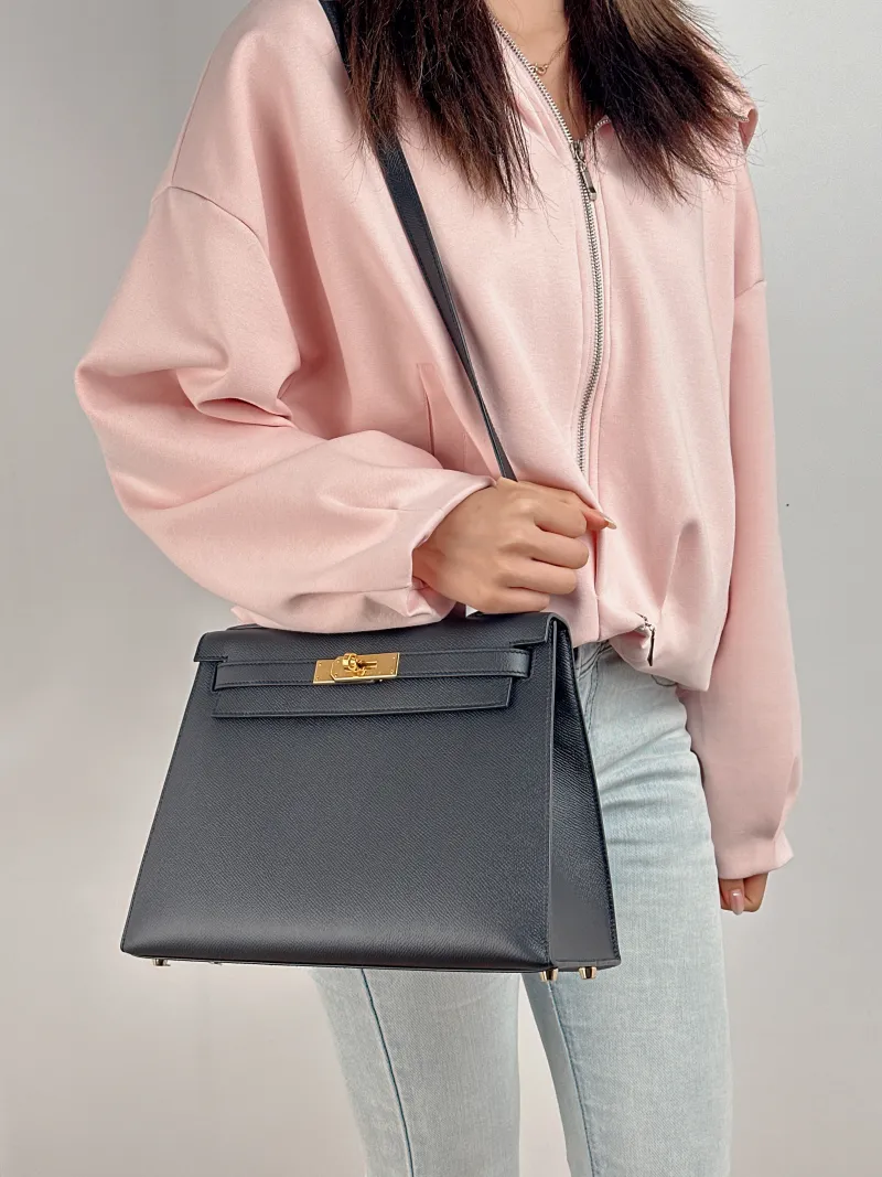 Hermès Shoulder Bag Kelly 28 Gold-Tone Hardware 89Black Epsom Calfskin Medium 28 × 10 × 22 cm C — on-model view 1 of 3