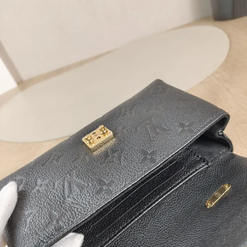 Louis Vuitton Crossbody Bag MADELEINE Black Monogram Empreinte Embossed Calfskin nano 21 × 6 × 12.5 cm — detail view 6 of 12