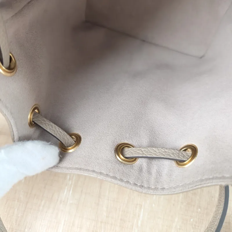 Louis Vuitton Crossbody Bag NANO NOÉ Bucket Bag Nano · White Monogram Empreinte Embossed Calfskin nano 13 × 10 × 16 cm — detail view 7 of 10