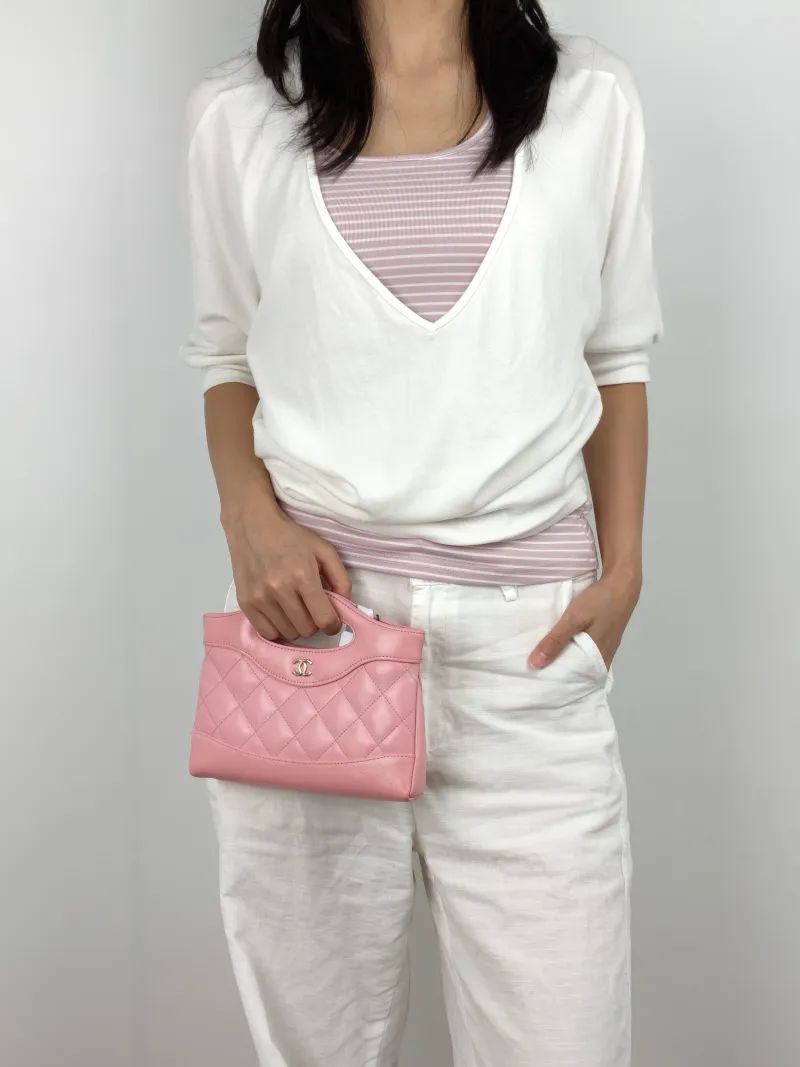 Chanel Crossbody Bag 31Bag Pink Waxed Leather nano 20.5 × 3.5 × 17 cm — on-model view 1 of 3