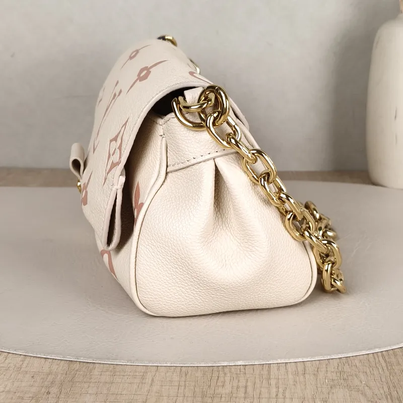 Louis Vuitton Crossbody Bag Favorite White · Pink Empreinte Embossed Calfskin Monogram Medium24 × 9 × 14 cm — detail view 3 of 14