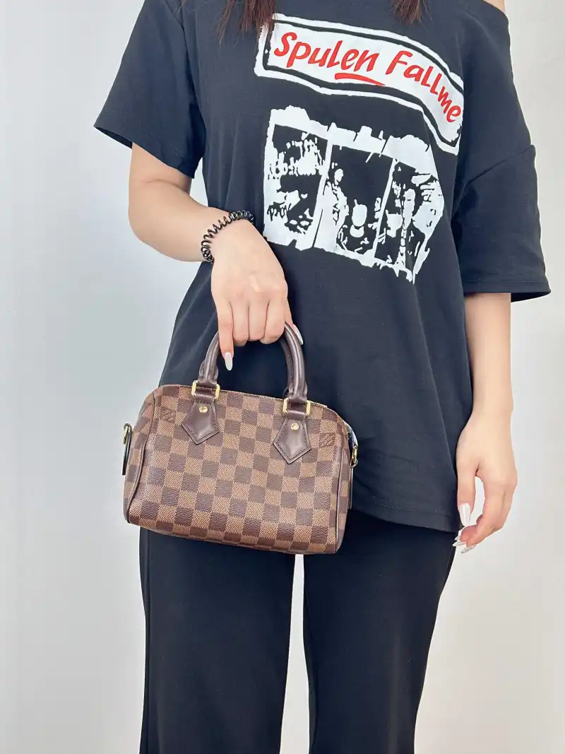 Louis Vuitton Crossbody Bag Speedy20 Shoulder Strap PVC Small20.5 × 12 × 13.5 cm — on-model view 1 of 3