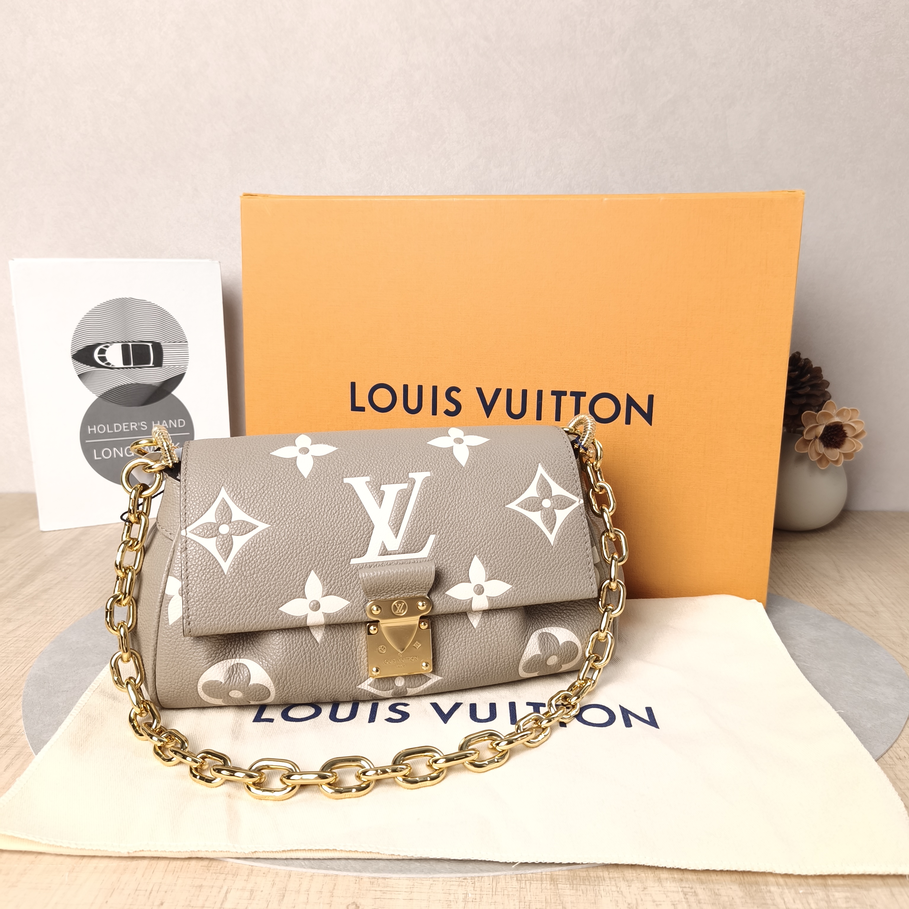 Louis Vuitton Crossbody Bag Favorite Empreinte Embossed Calfskin Monogram Medium24 × 9 × 14 cm — cover view 2 of 6