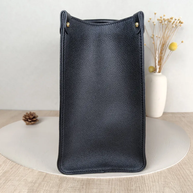 Louis Vuitton Shoulder Bag Onthego Medium Black · White Empreinte Embossed Calfskin Monogram Medium35 × 14 × 27 cm — detail view 6 of 10
