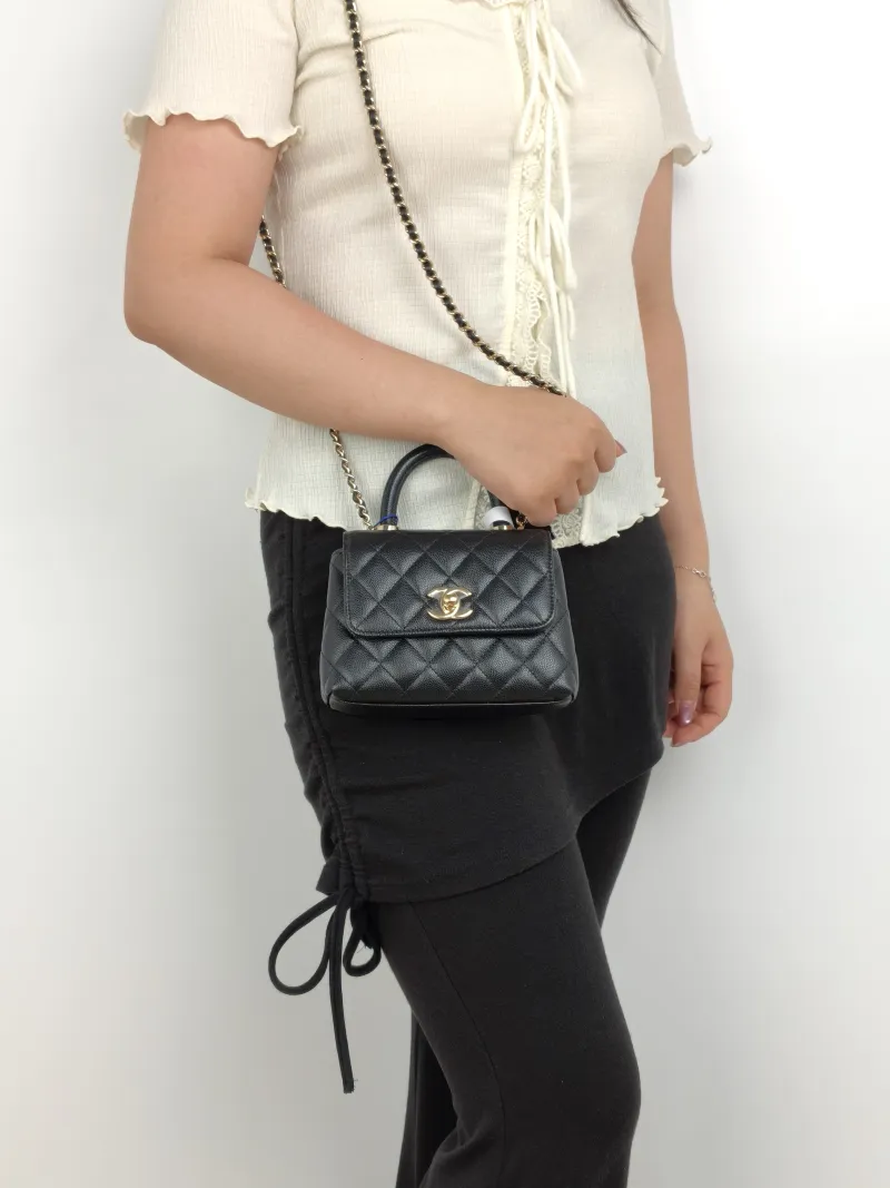 Chanel Top Handle Bag Coco Handle​Black Grained Calfskin Mini14.5 × 5.5 × 11.5 cm — on-model view 1 of 3