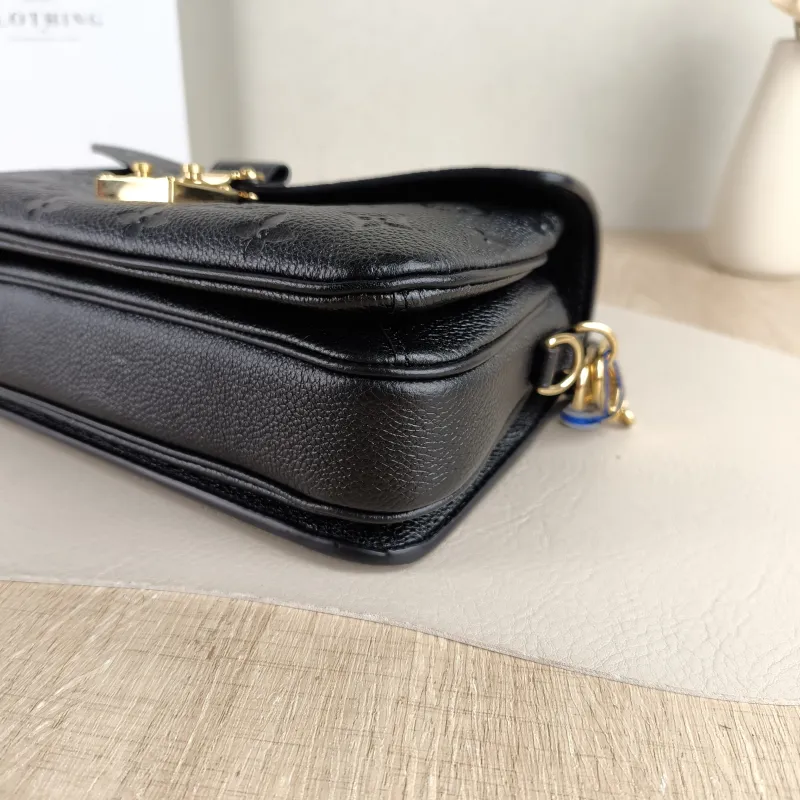 Louis Vuitton Crossbody Bag Pochette Métis East West Black Empreinte Embossed Calfskin Small 21.5 × 6 × 13.5 cm — detail view 14 of 15