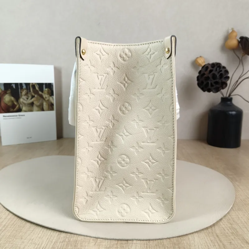 Louis Vuitton Shoulder Bag Onthego Medium White Empreinte Embossed Calfskin Medium 35 × 14 × 27 cm — detail view 8 of 12