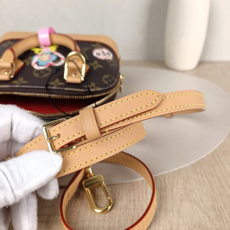 Louis Vuitton Crossbody Bag Alma Nano vivenne Monogram PVC nano 18 × 8 × 12 cm — detail view 10 of 11