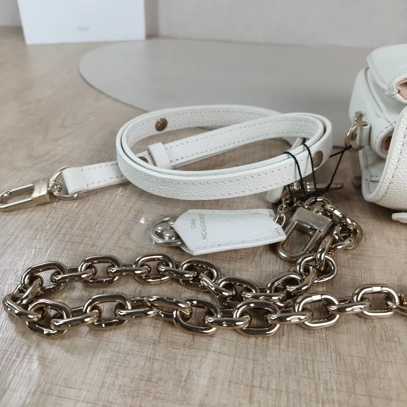 Louis Vuitton Crossbody Bag Pochette Métis East West White · Pink Monogram Empreinte Embossed Calfskin Small 21.5 × 6 × 13.5 cm — detail view 7 of 13