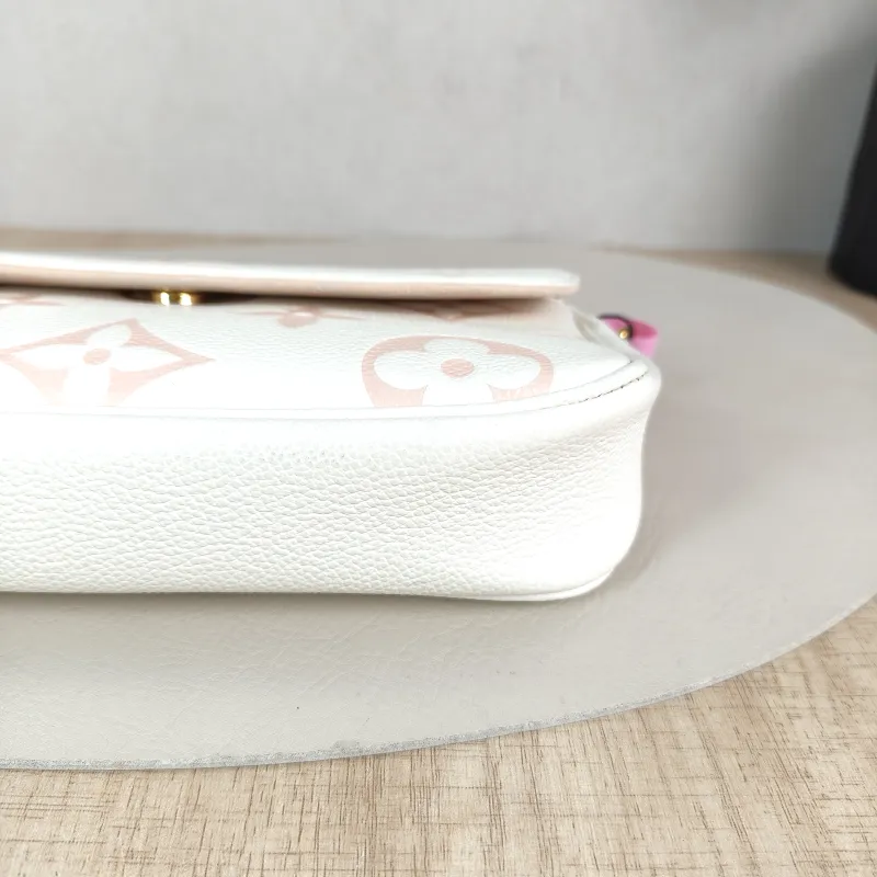 Louis Vuitton Crossbody Bag IVY White · Pink Monogram Empreinte Embossed Calfskin Small 23.5 × 4.3 × 12 cm — detail view 6 of 11