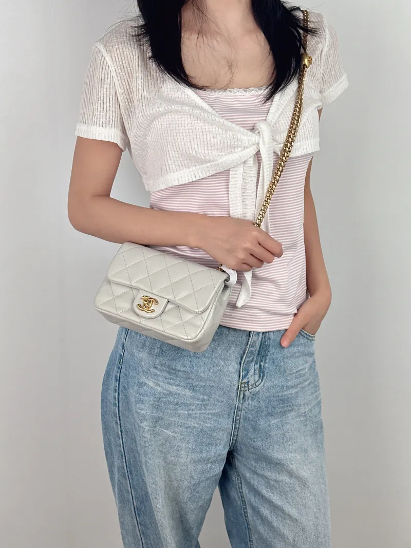 Chanel Crossbody Bag Grey Lambskin One Size19 × 5 × 12.5 cm — on-model view 2 of 3
