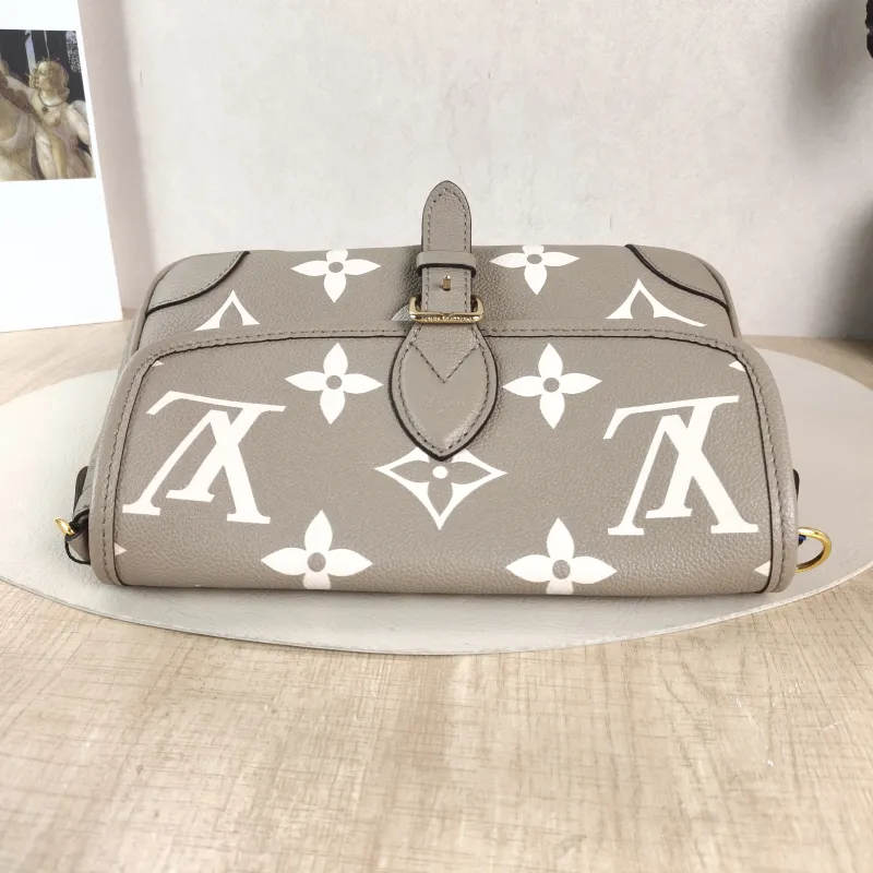 Louis Vuitton Crossbody Bag Diane Baguette Bag Monogram Empreinte Embossed Calfskin Small 24 × 9 × 15 cm — detail view 5 of 13