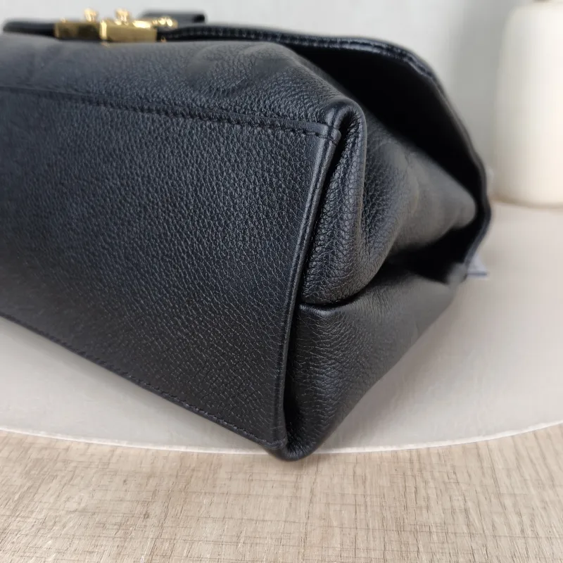 Louis Vuitton Crossbody Bag MADELEINE Black Monogram Empreinte Embossed Calfskin Medium 30 × 11 × 19.5 cm — detail view 5 of 11