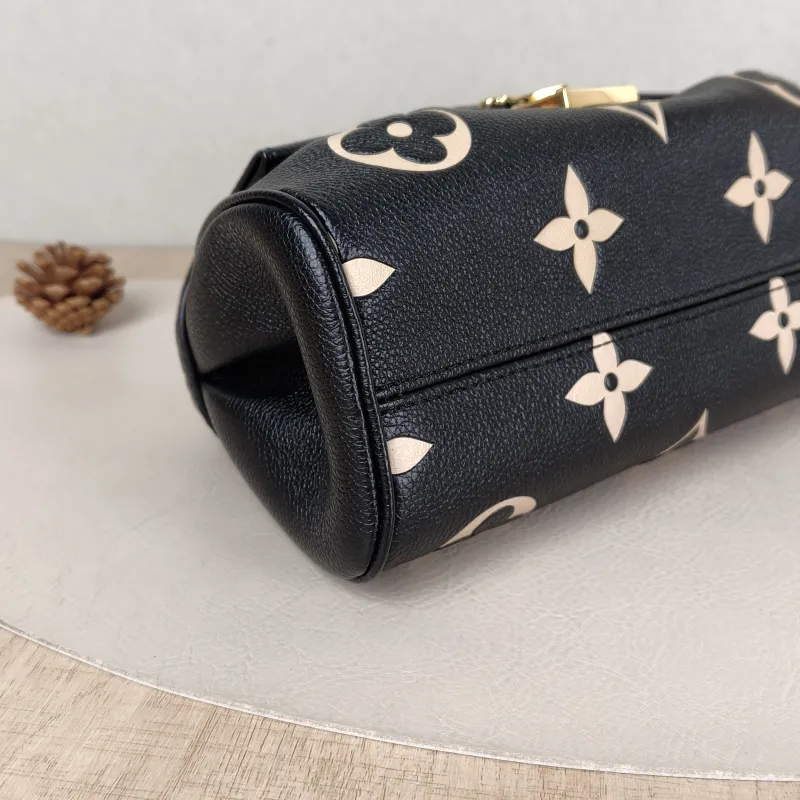 Louis Vuitton Crossbody Bag Favorite Black · White Empreinte Embossed Calfskin Medium 24 × 9 × 14 cm — detail view 2 of 12