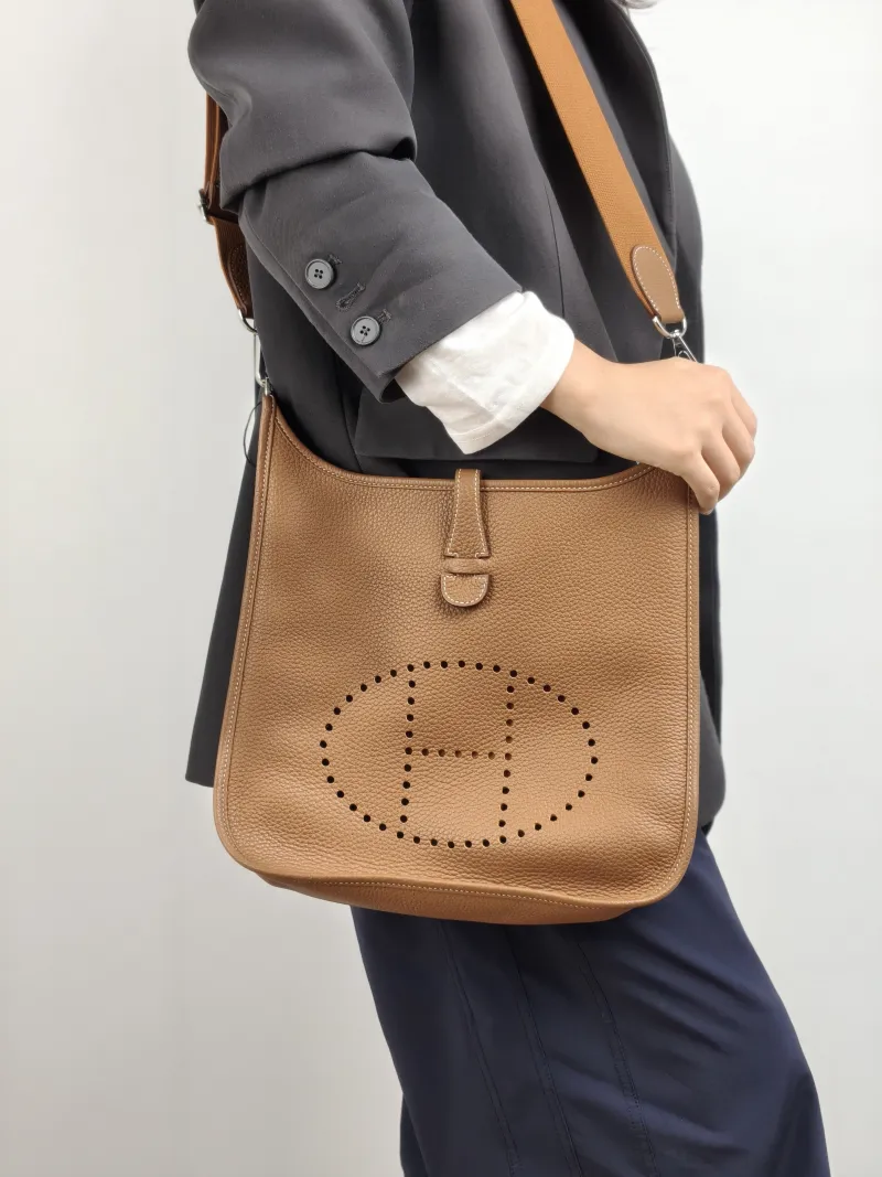 Hermès Crossbody Bag Evelyne 29 29 37 Brown TC Calfskin 29 29 × 7 × 30 cm W — on-model view 2 of 2