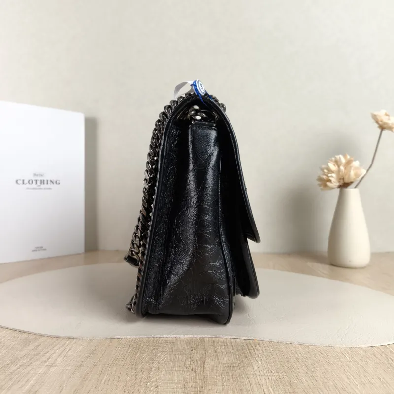 SAINT LAURENT Crossbody Bag Niki D Waxed Leather Calfskin Medium 28 × 8.5 × 20 cm — detail view 7 of 14