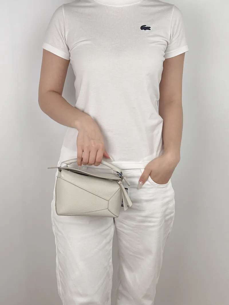 LOEWE Crossbody Bag Puzzle White CC alfskin Mini 18 × 8 × 12.5 cm — on-model view 2 of 3