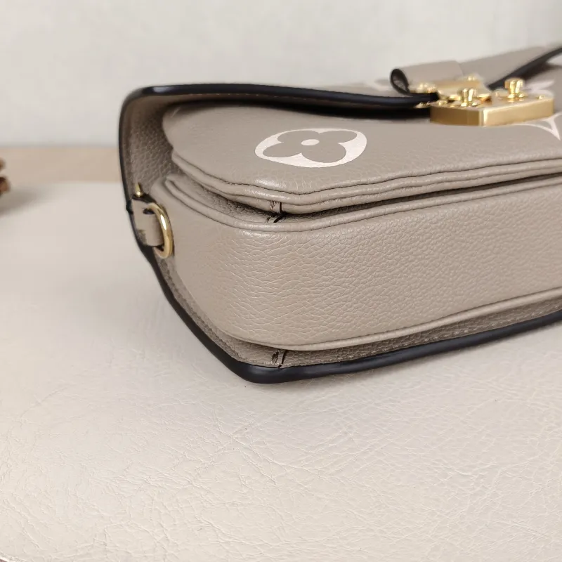 Louis Vuitton Crossbody Bag Pochette Métis East West Empreinte Embossed Calfskin Monogram Small21.5 × 6 × 13.5 cm — detail view 14 of 15