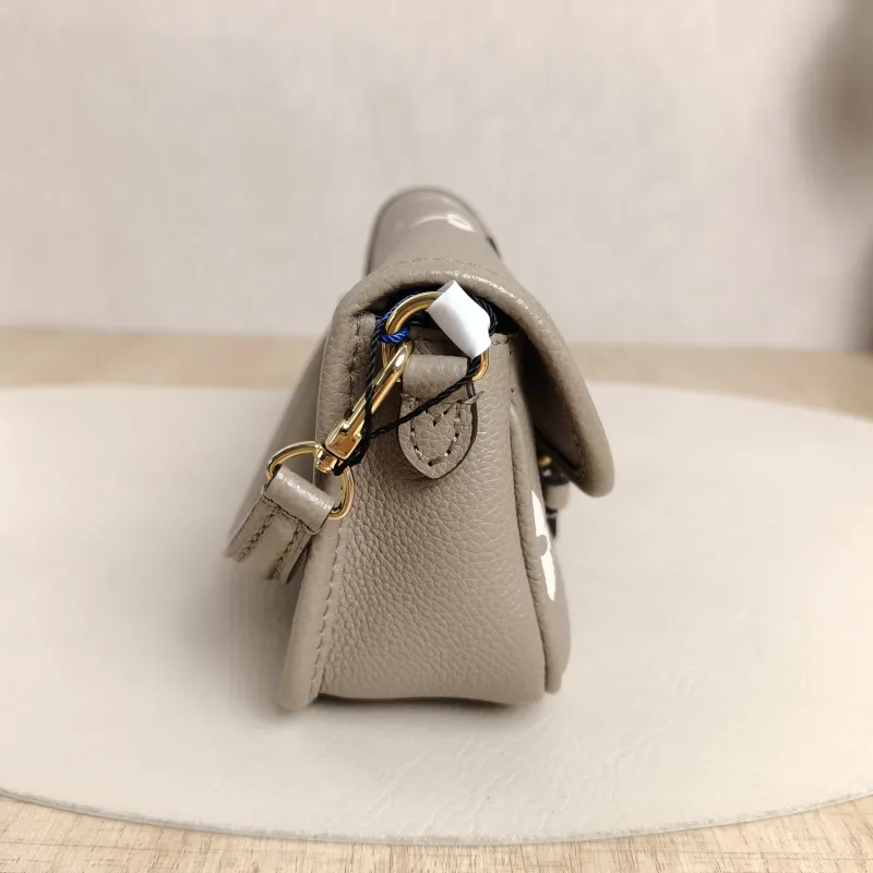 Louis Vuitton Crossbody Bag Diane Baguette Bag Empreinte Embossed Calfskin Monogramnano19 × 6 × 10.5 cm — detail view 8 of 13