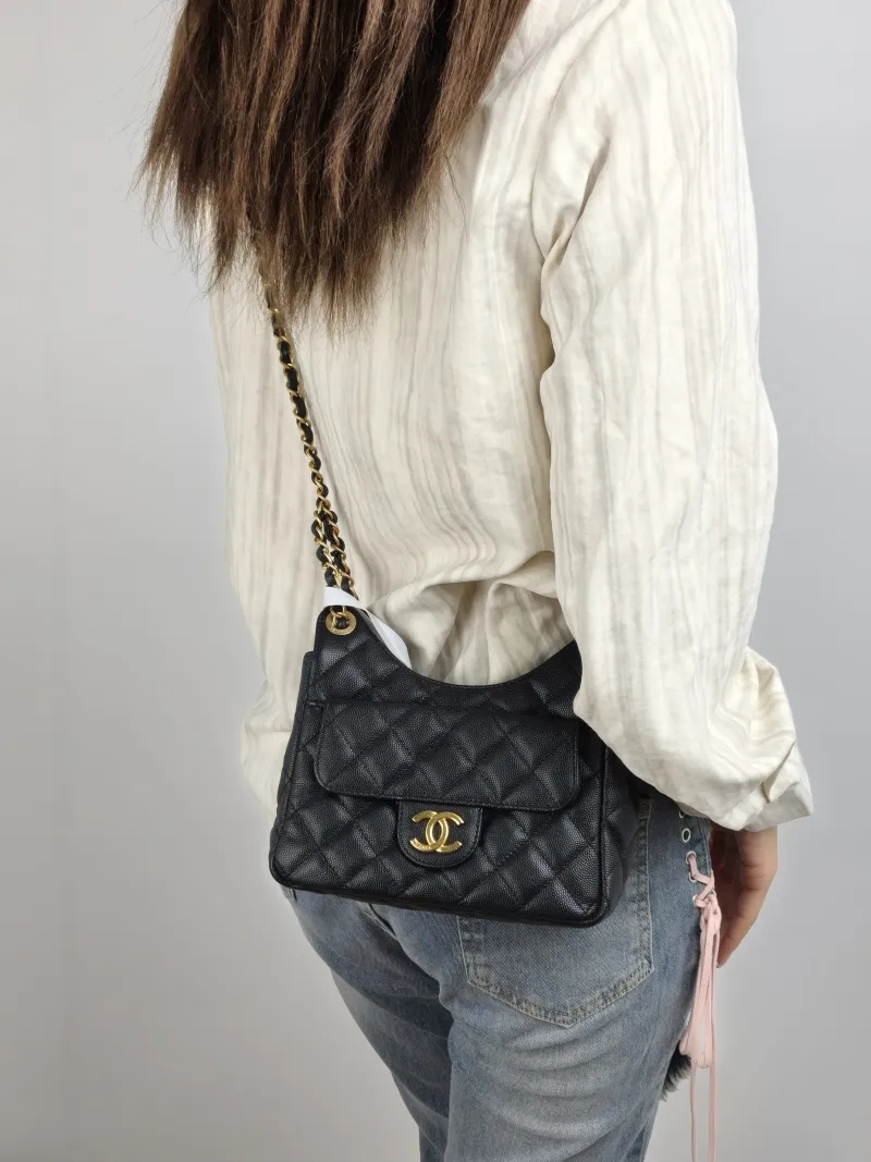 Chanel Crossbody Bag HOBO Black Grained Calfskin Small 19 × 6 × 17 cm — on-model view 1 of 2