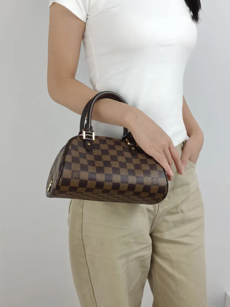 Louis Vuitton Top Handle Bag Ribera Damier Ebene PVC 23 × 13 × 14 cm — on-model view 2 of 2