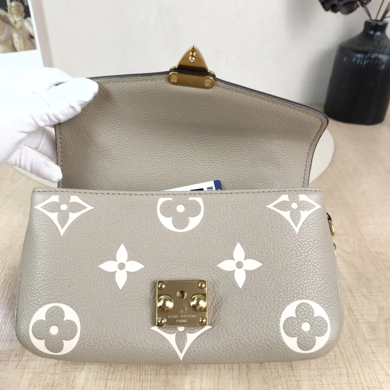 Louis Vuitton Crossbody Bag Pochette Métis East West Monogram Empreinte Embossed Calfskin Small 21.5 × 6 × 13.5 cm — detail view 10 of 13