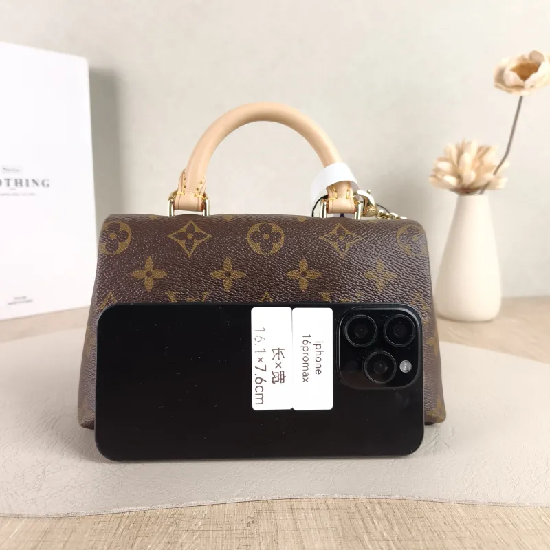 Louis Vuitton Crossbody Bag MADELEINE Monogram PVC nano 21 × 6 × 12.5 cm — cover view 4 of 5