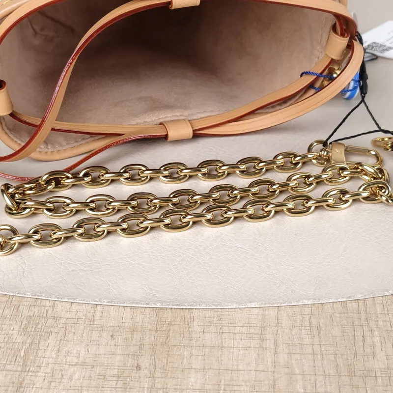 Louis Vuitton Crossbody Bag NOÉ PURSE LV CHARMS PVC Mini 11.5 × 11.5 × 11.5 cm — detail view 9 of 10