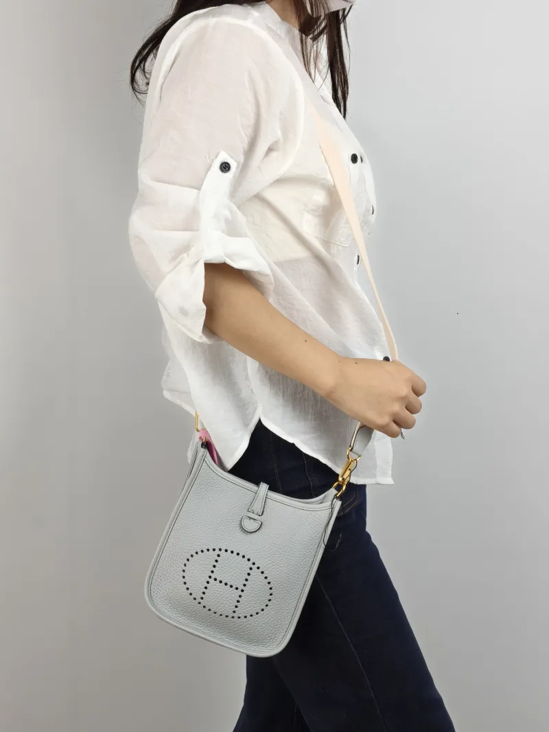 Hermès Crossbody Bag Evelyne Mini 16 Mini 16 TC Calfskin Mini 17 × 5.5 × 18 cm u Shoulder Strap — on-model view 2 of 2