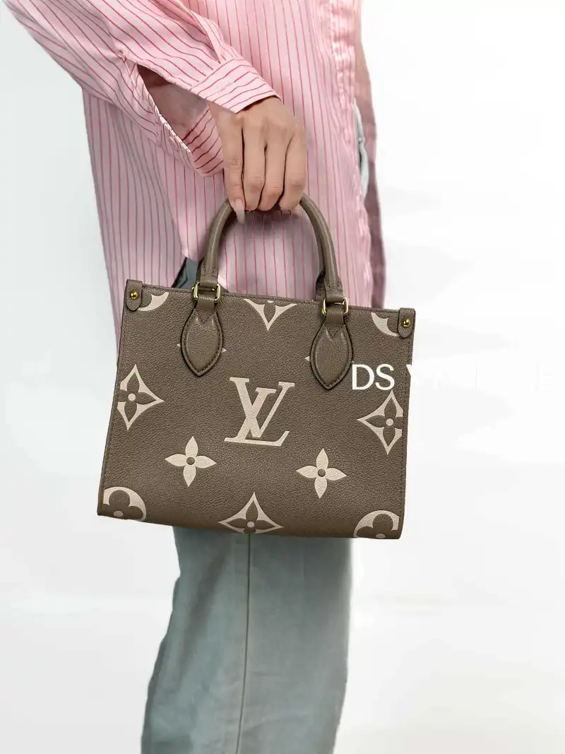Louis Vuitton Shoulder Bag Onthego · White Empreinte Embossed Calfskin Small25 × 11.5 × 19 cm — on-model view 1 of 3