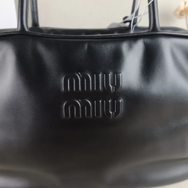 Miumiu Top Handle Bag Beau Black Calfskin Large 34 × 10 × 23 cm — detail view 9 of 12