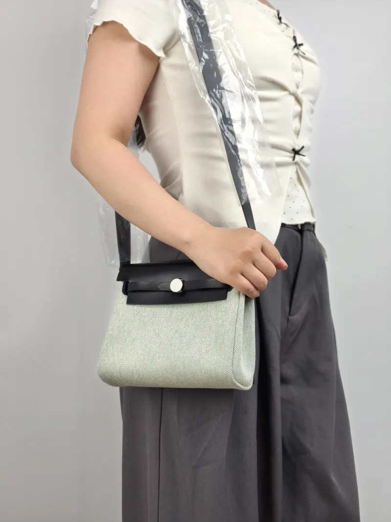 Hermès Crossbody Bag Herbag Zip 20 Beige · Green · Black Calfskin，Canvas Mini 20.5 × 7 × 16.5 cm G — on-model view 2 of 2