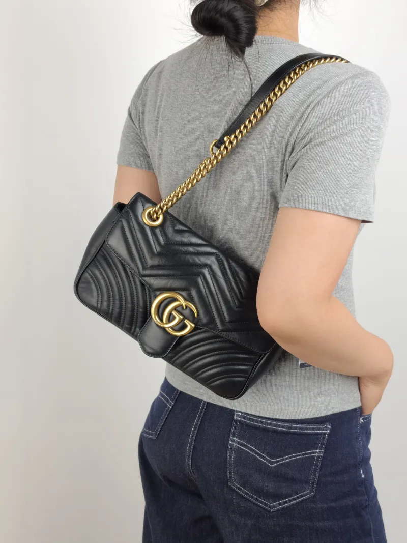 GUCCI Crossbody Bag GG Marmont Medium Marmont 26 Black CC alfskin Medium 26 × 7 × 15 cm — on-model view 2 of 2