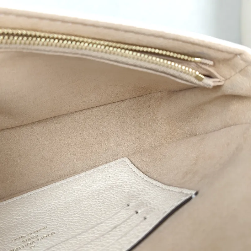 Louis Vuitton Crossbody Bag IVY White Monogram Empreinte Embossed Calfskin Small 23.5 × 4.3 × 12 cm — detail view 3 of 11