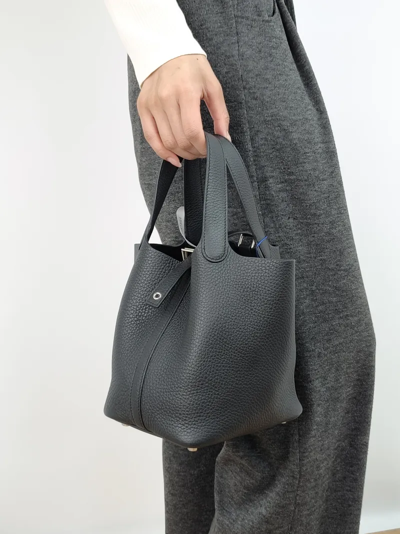 Hermès Top Handle Bag Picotin Lock 18 1889Black Clemence Taurillon TC Calfskin Small18 × 13 × 19 cm — on-model view 4 of 5