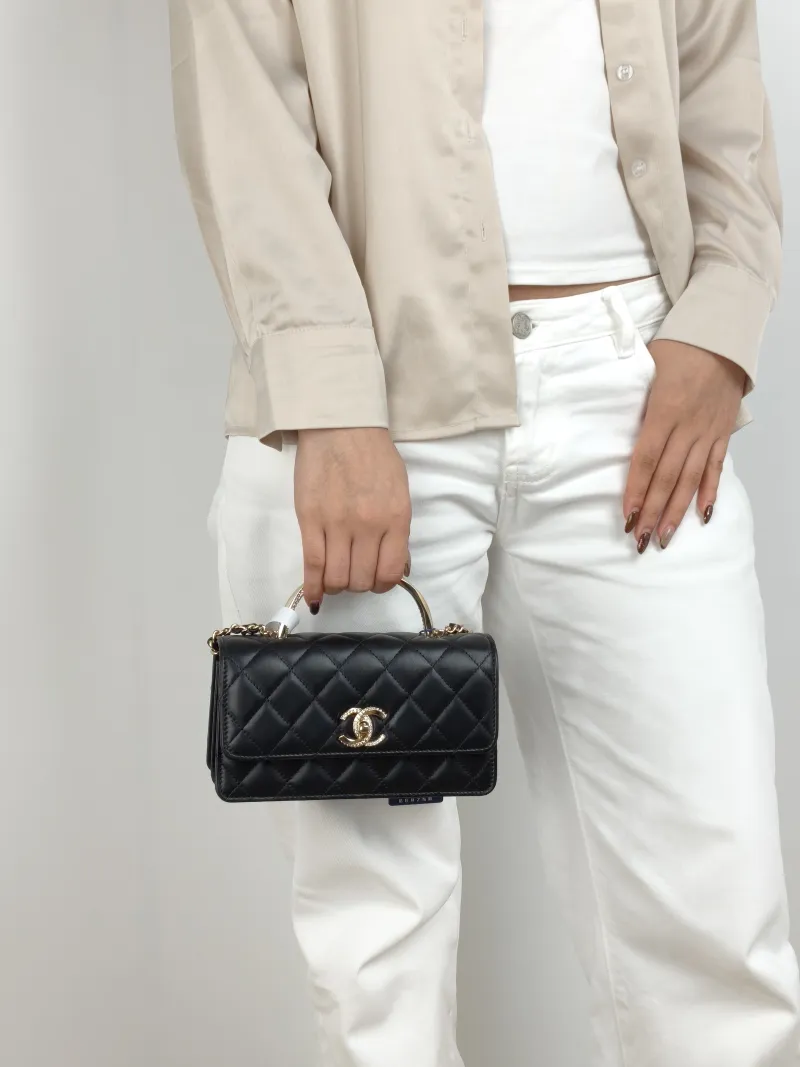 Chanel Crossbody Bag woc Black Lambskin 19 × 4 × 11.5 cm — on-model view 3 of 3