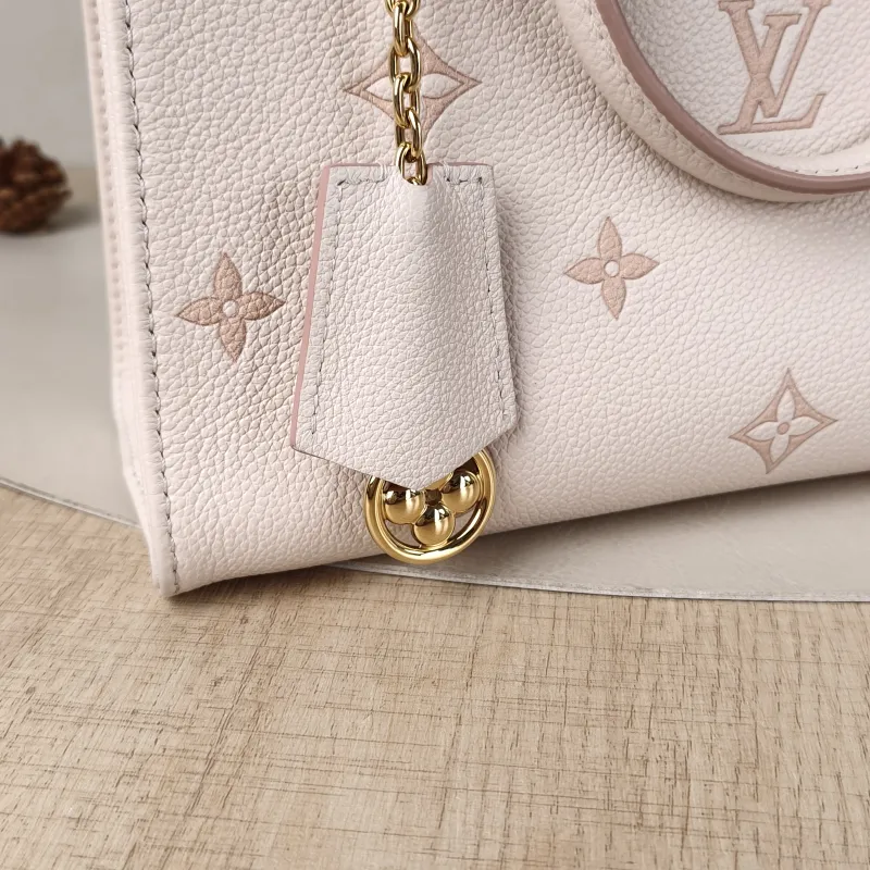 Louis Vuitton Shoulder Bag Onthego Beige · Pink Empreinte Embossed Calfskin Small25 × 11.5 × 19 cm — detail view 10 of 13